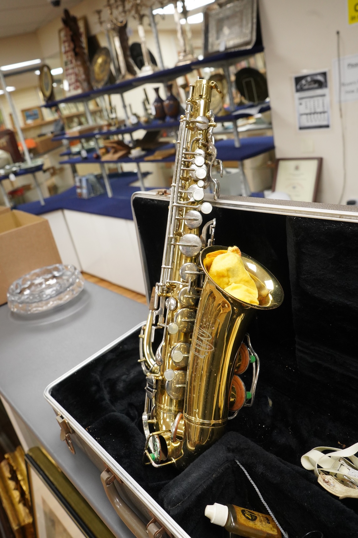 A cased Buesohner Aristocrat alto saxophone